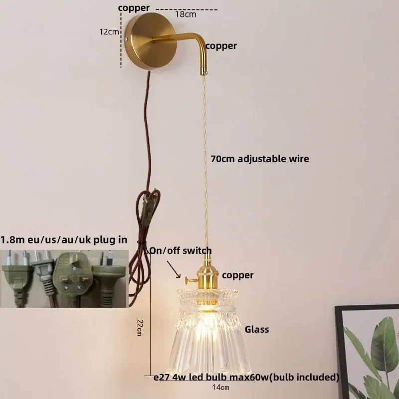 Modern gold wall lamp with clear glass shade featuring a faceted pendant and brass-finished copper mount, decorbites clear glass