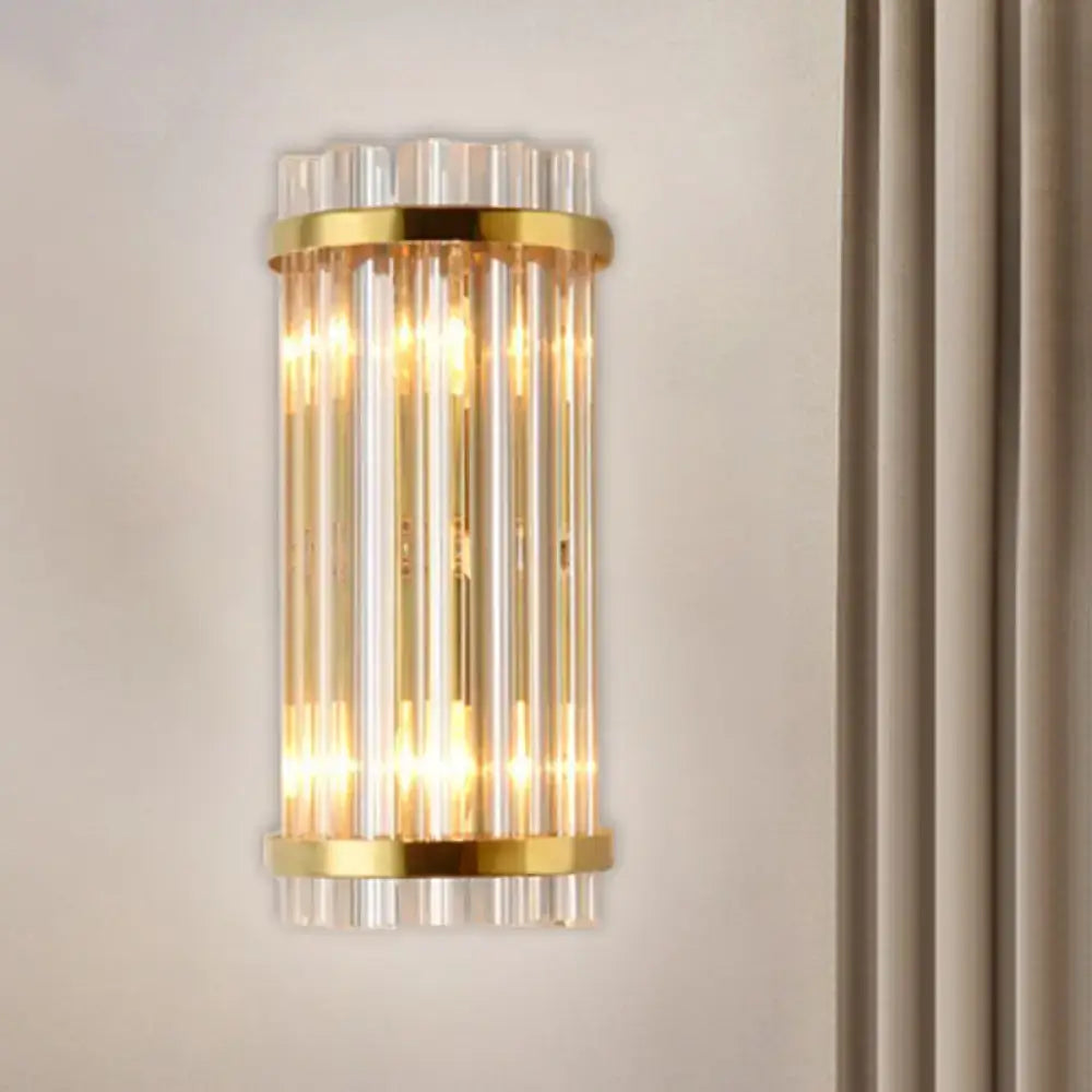 Modern gold wall lamp with crystal rod shade featuring vertical clear glass rods for elegant bedroom sconce lighting