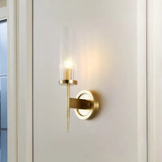 Modern gold wall sconce with clear vertically ribbed glass shade featuring led light for 110v-120v or 220v-240v use