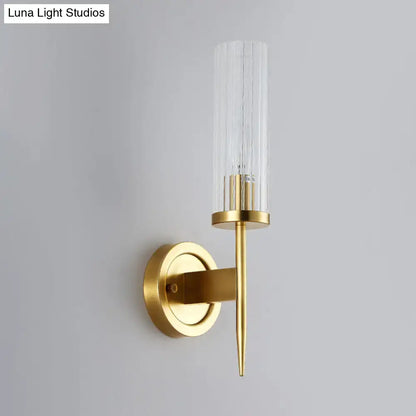 Modern gold wall sconce with clear ribbed glass shade and sleek finish compatible with 110v-120v led incandescent fluorescent