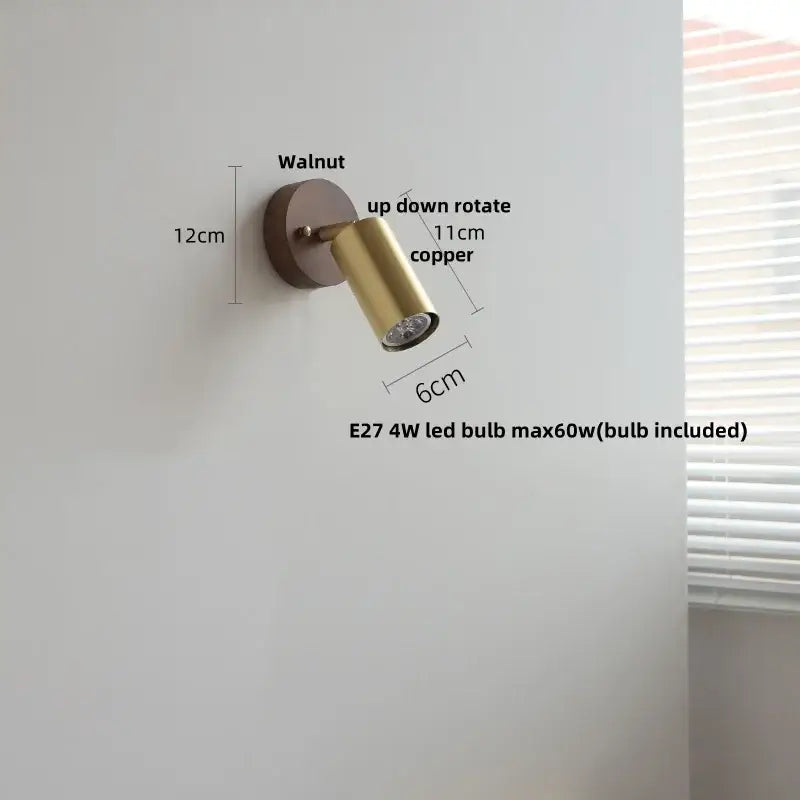 Modern gold walnut wall sconce with copper finish, pull chain switch, and adjustable up-down rotation for bedroom lighting