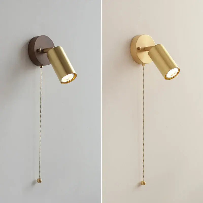 Modern gold walnut wall sconce with pull chain switch and cylindrical gold-finished spotlight for bedroom lighting