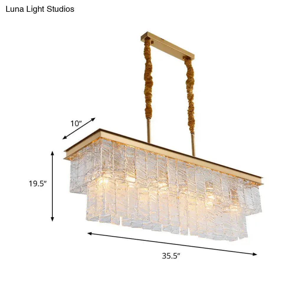 Modern gold water crystal pendant light with cascading textured glass panels and twisted rope suspension cords ceiling light
