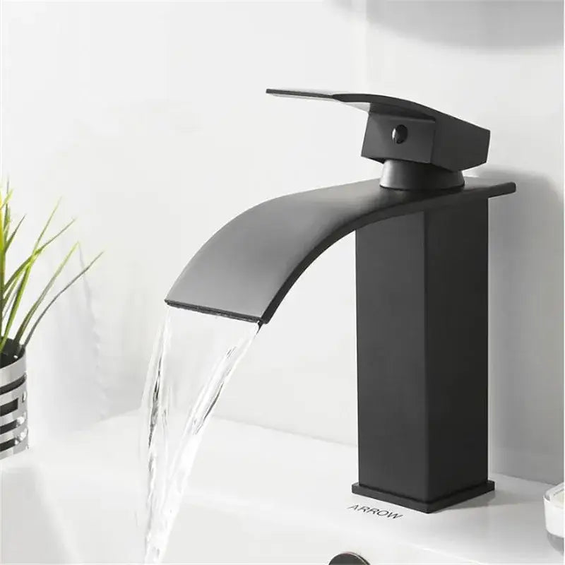 Black matte-finish modern basin faucet with a sleek waterfall-style spout for decorbites gold waterfall basin use