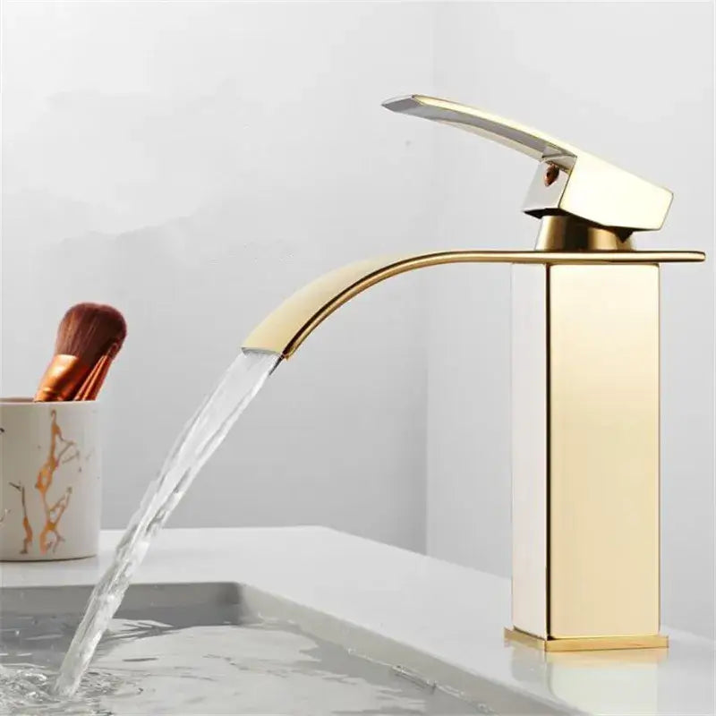Modern gold waterfall basin faucet by decorbites with sleek rectangular design and flowing waterfall spout for bathroom use