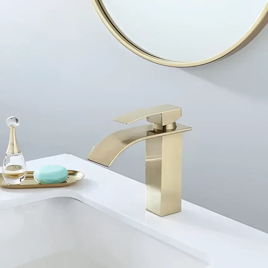 Modern gold waterfall basin faucet with gold-toned rectangular design and curved spout for bathroom decorbites gold waterfall