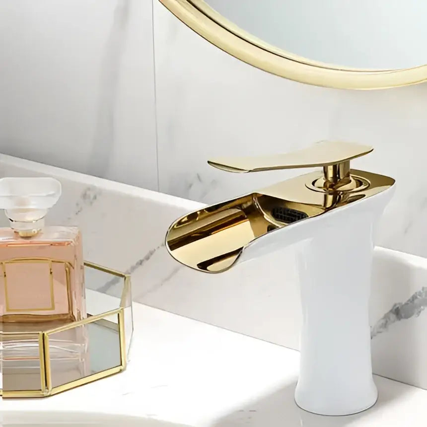 Modern gold waterfall basin faucet with polished metallic finish and single lever for bathroom decorbites gold waterfall
