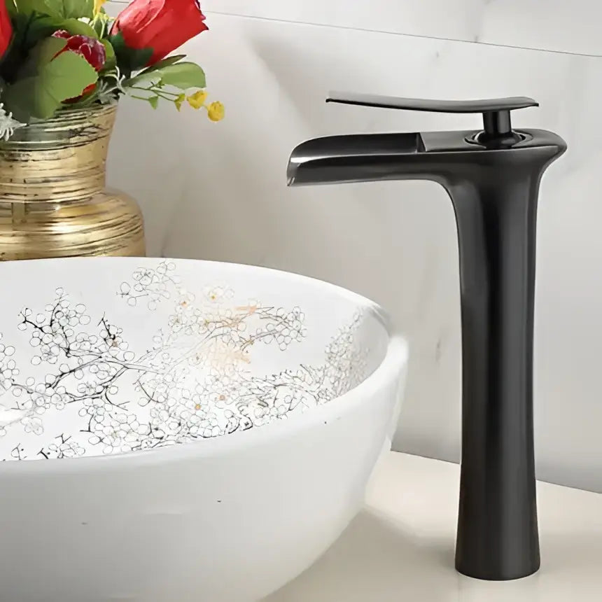 Black matte basin faucet with sleek modern design and flat rectangular spout handle for decorbites gold waterfall tap