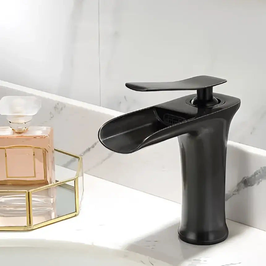 Black matte waterfall basin faucet with sleek modern design complementing decorbites gold waterfall taps