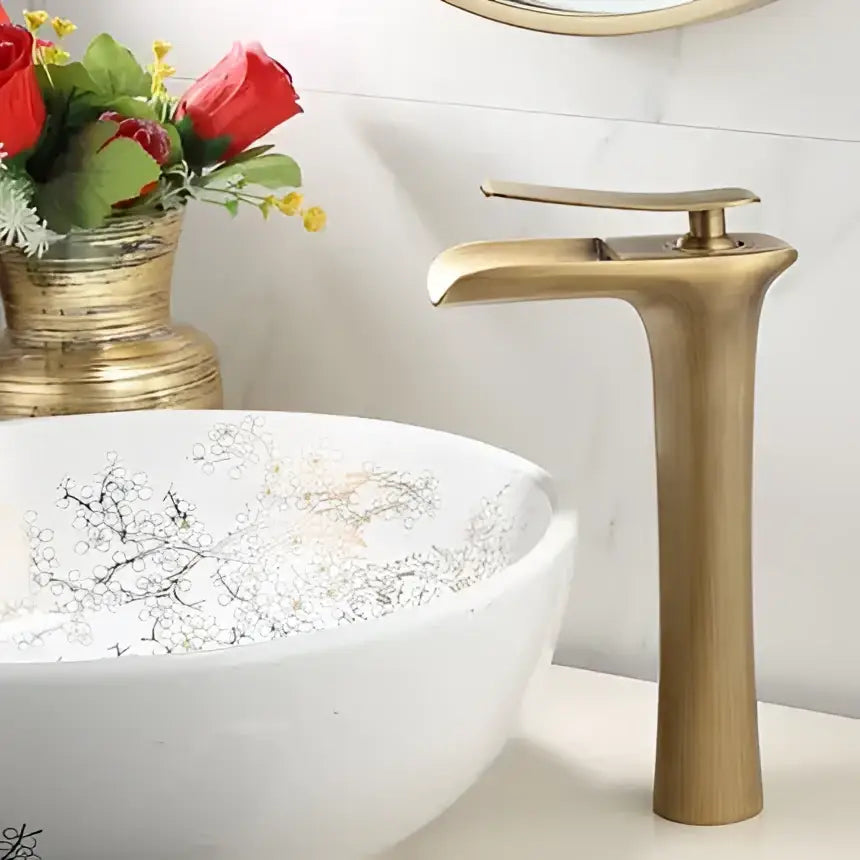 Modern decorbites gold waterfall basin faucet with brass finish and sleek tall design for bathroom use