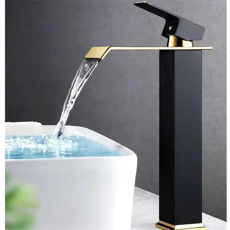 Modern gold waterfall basin faucet featuring a sleek black and gold design for bathroom sink decorbites gold waterfall tap