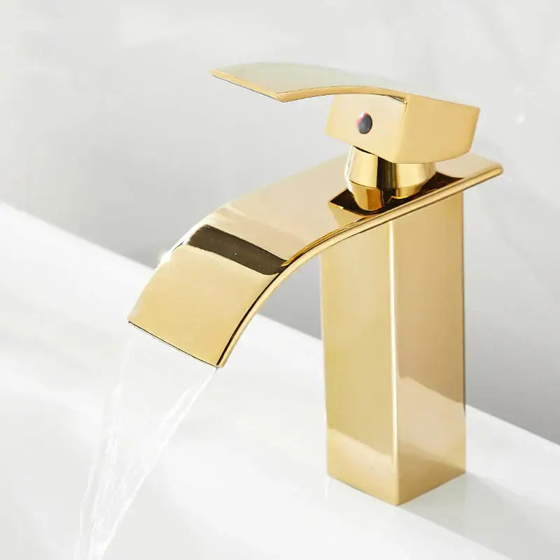 Modern gold waterfall basin faucet with sleek rectangular spout and handle for bathroom sink decorbites gold waterfall design