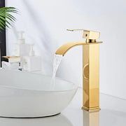 Modern gold waterfall basin faucet with a sleek rectangular design and waterfall spout for bathroom sink decorbites gold waterfall