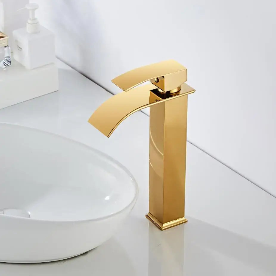Modern gold waterfall basin faucet with a sleek rectangular design and curved spout for bathroom sink mixer tap decorbites gold waterfall