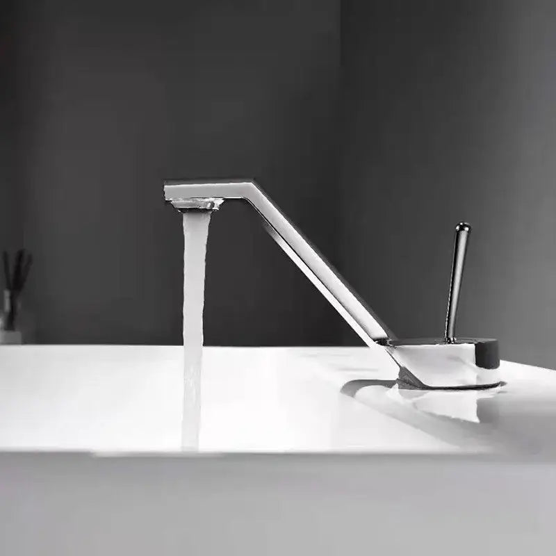 Modern chrome-finished basin faucet with sleek angular design and single lever handle for decorbites black basin use