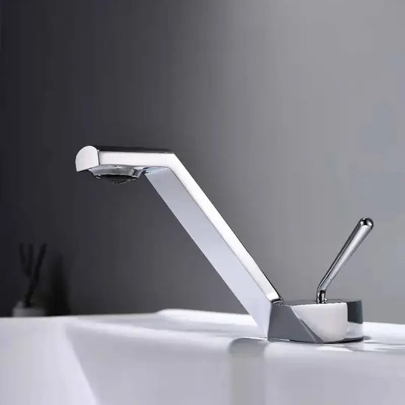 Modern chrome-finished basin faucet with sleek angular design and single lever handle for decorbites black basin