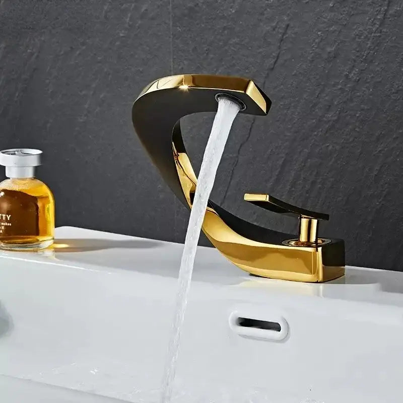 Modern gold waterfall brass basin faucet with sleek two-tone gold and black design for bathroom sink decorbites brass basin tap