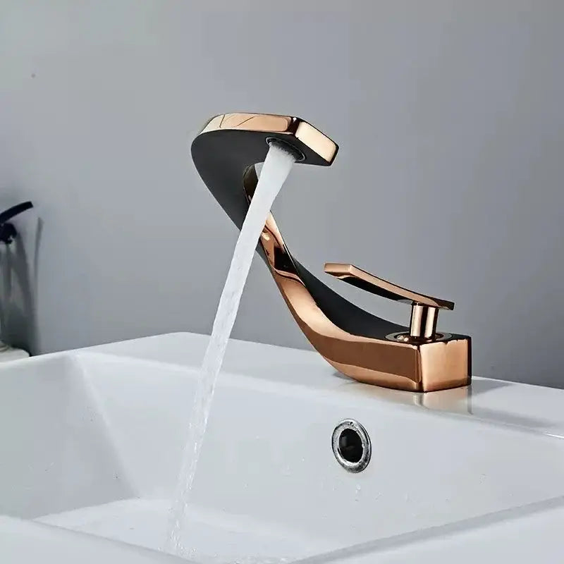 Modern gold waterfall brass basin faucet with rose gold and black finish and sleek curved design for bathroom sink decorbites brass basin faucet
