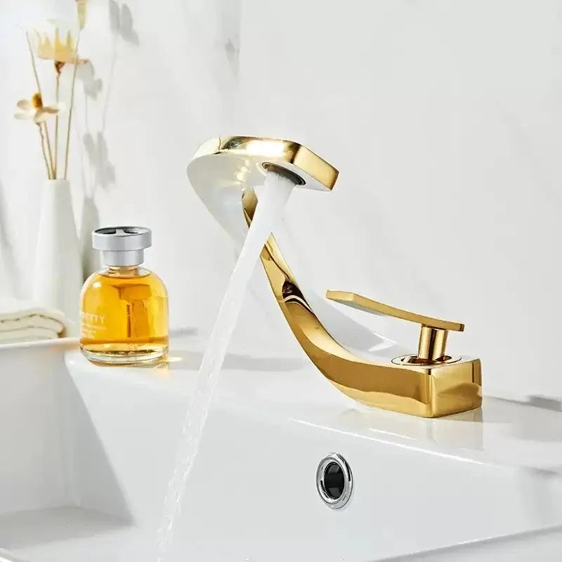 Modern gold waterfall brass basin faucet with sleek polished metallic finish for bathroom sink decorbites brass basin faucet