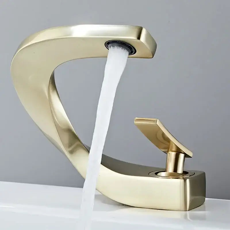 Modern gold waterfall brass basin faucet with sleek curved design and single lever handle for bathroom sink decorbites brass basin faucet