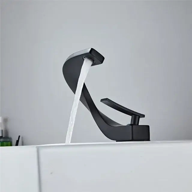 Modern black matte finish faucet with sleek curved spout and minimalist design for bathroom use