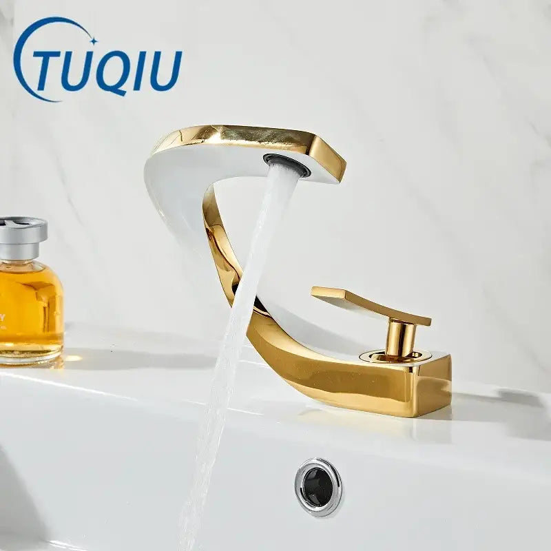Modern gold waterfall mixer bathroom faucet with a gold-toned polished finish and sleek curved design