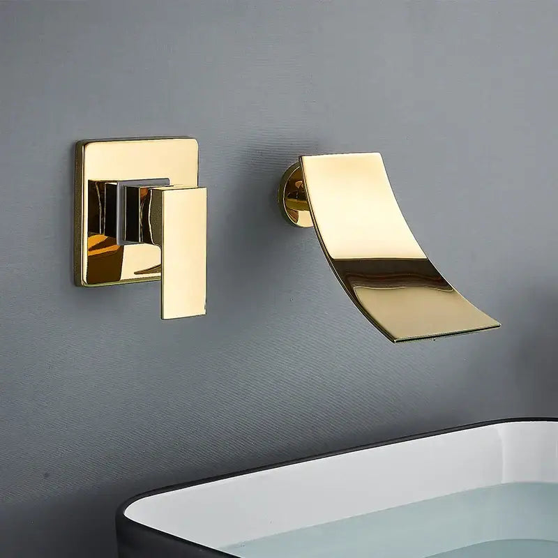 Modern gold waterfall wall mount faucet with gold-toned curved spout and square handle for bathroom basin decorbites gold waterfall
