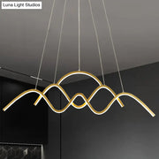 DecorBites™ modern gold metal LED light fixture with wave design and integrated warm white lighting for dining room