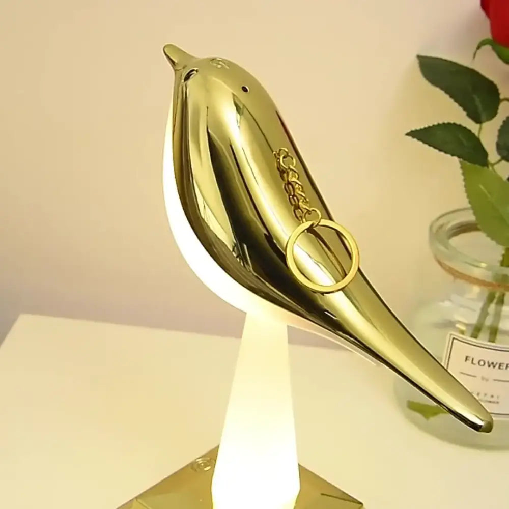 Shiny gold bird table lamp desk with sleek minimalist design and warm light for modern bedroom aromatherapy decorbites bird table