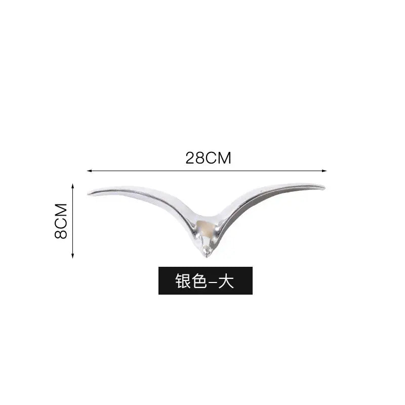 Silver-colored sleek bird-shaped car ornament with polished metallic finish for modern pendant wall decor use