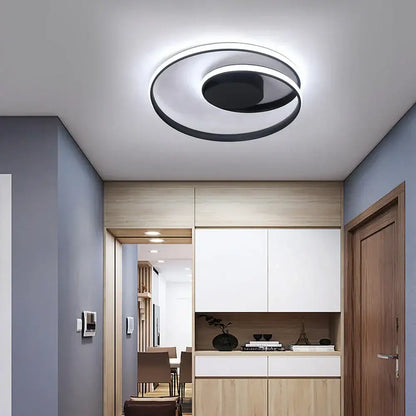 Modern gold and white decorbites dimmable led ceiling lamp with a sleek black and white circular design for living room decor