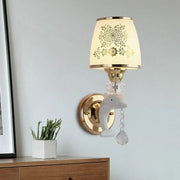 Modern gold and white dolphin wall sconce with opal glass shade and crystal beads for elegant bedroom lighting