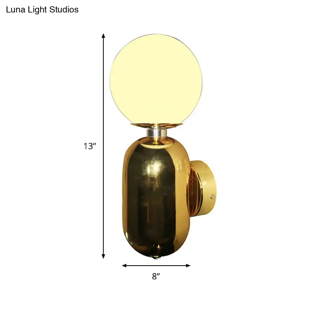 Modern gold wall sconce featuring a white glass globe with frosted finish and e26 e27 compatible base for bedroom lighting