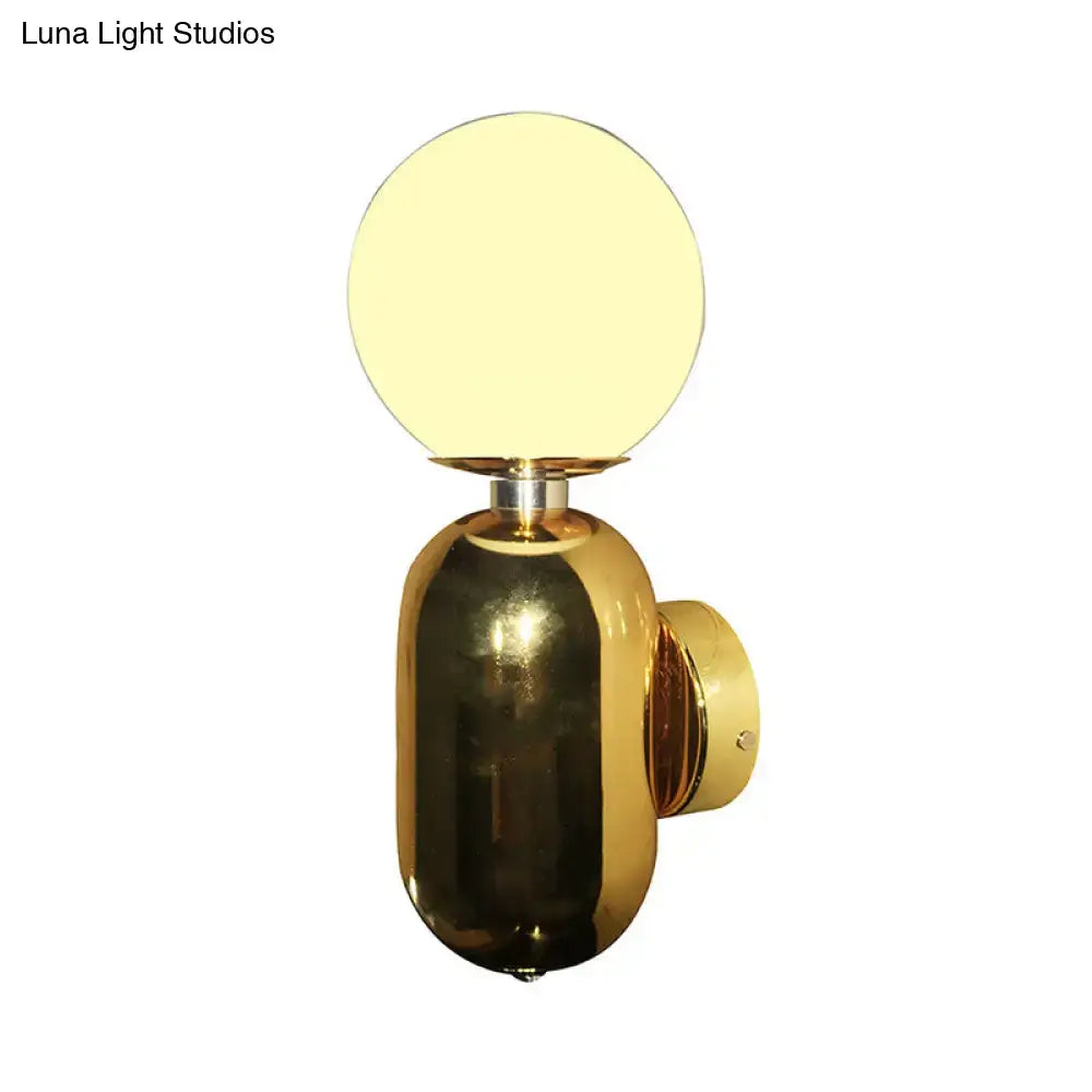 Modern gold wall sconce with white glass globe shade and sleek base compatible with e26 e27 bulbs for bedroom use