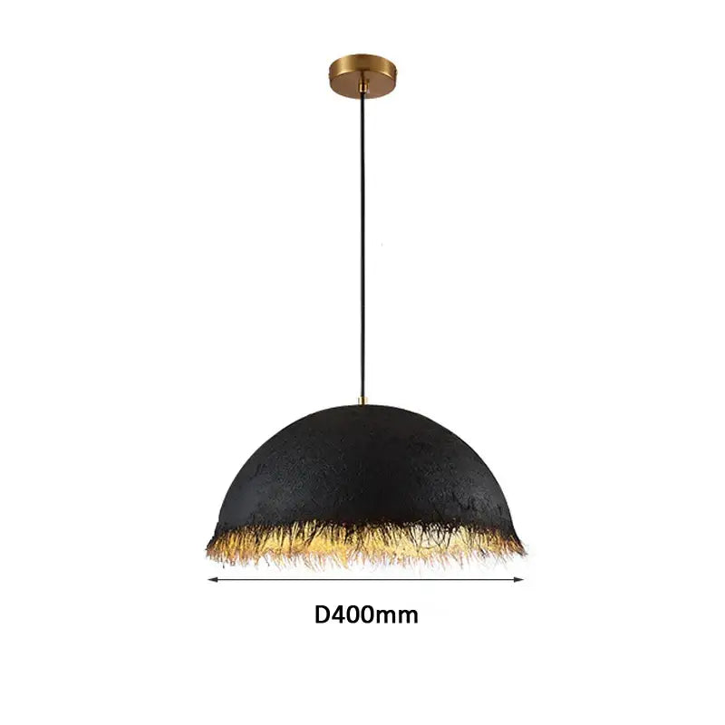 Black textured dome-shaped pendant lamp with gold fringe and brass mount for modern gold white half nest decorbites