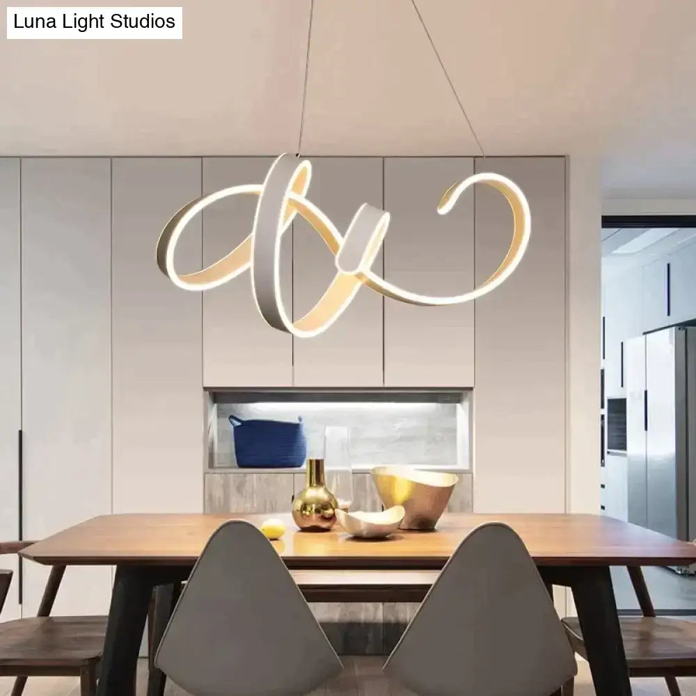 Modern gold and white led pendant lights featuring intertwined rings suspended for dining room lighting