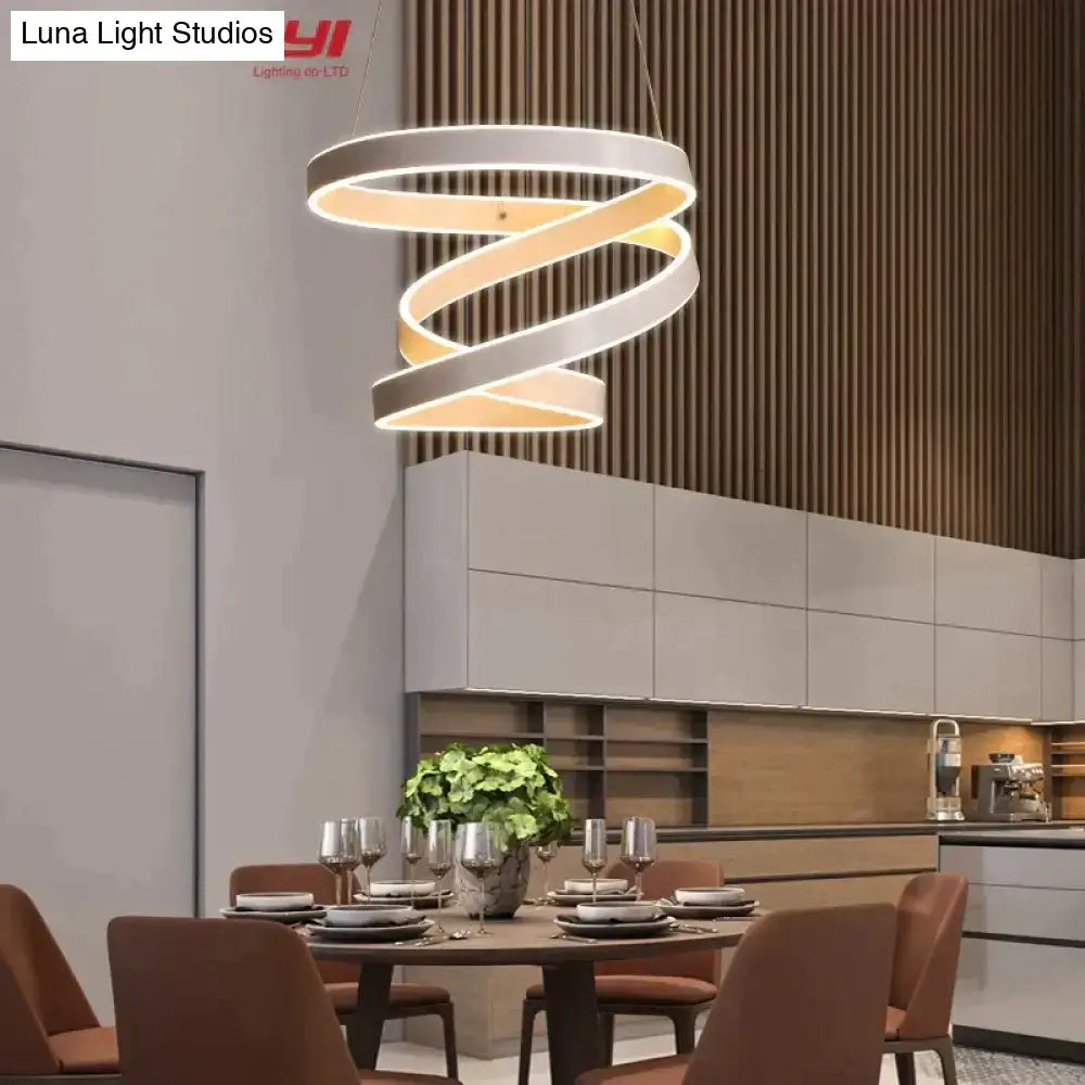 Modern gold and white led pendant lights with sleek white spiral design and warm led illumination for dining room