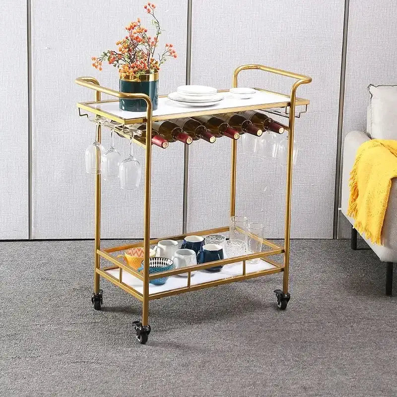 Modern gold and white marble bar cart drinks trolley with metal wine rack glassware holders and lower storage shelves