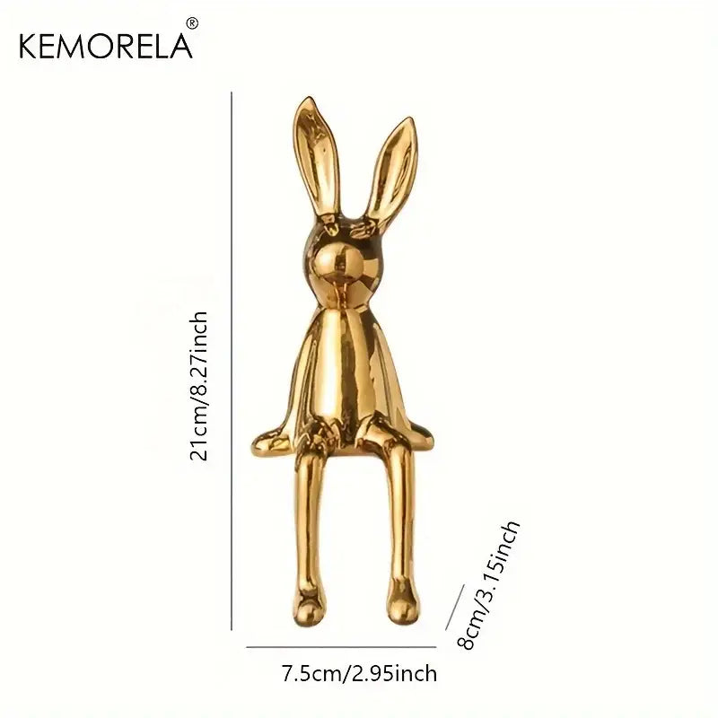 Modern gold sitting rabbit ornament with sleek glossy finish for living room decor