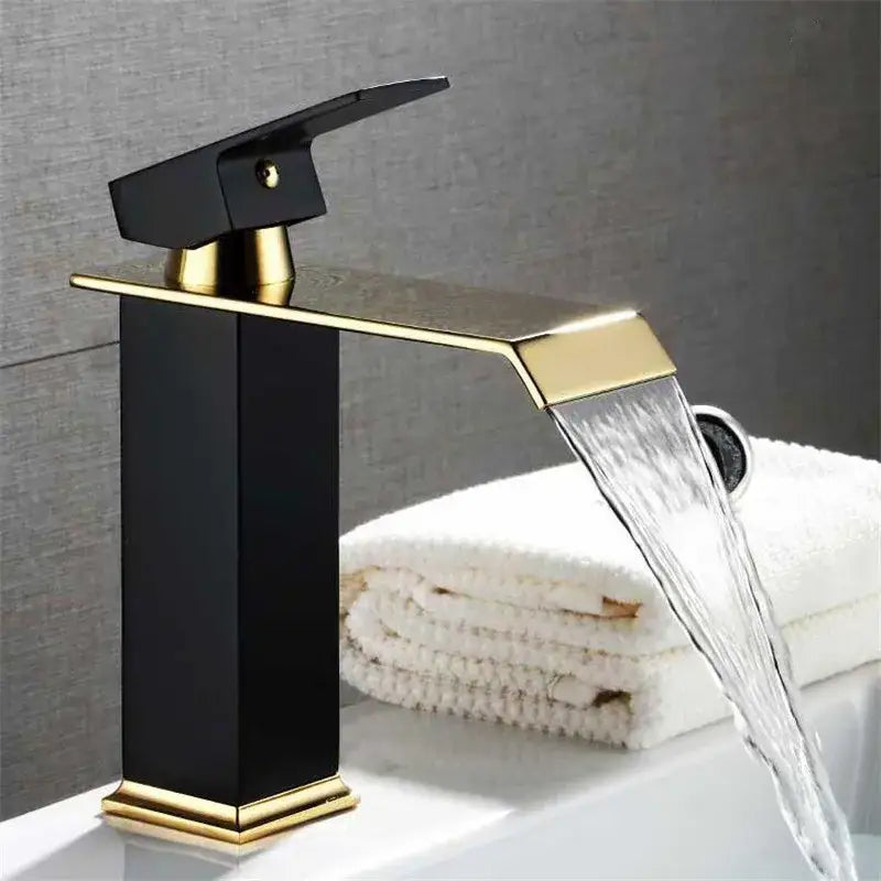 Modern black and gold waterfall basin faucet with sleek design for bathroom sink decorbites gold white style