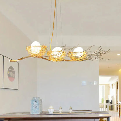 Decorbites gold wire mesh bird nest chandelier with three white glass bulbs in woven mesh bird nest design