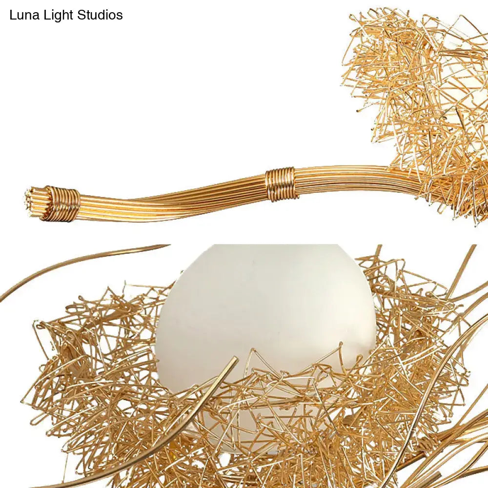 Gold wire mesh bird nest chandelier with smooth white egg nestled inside modern 3-light island lighting