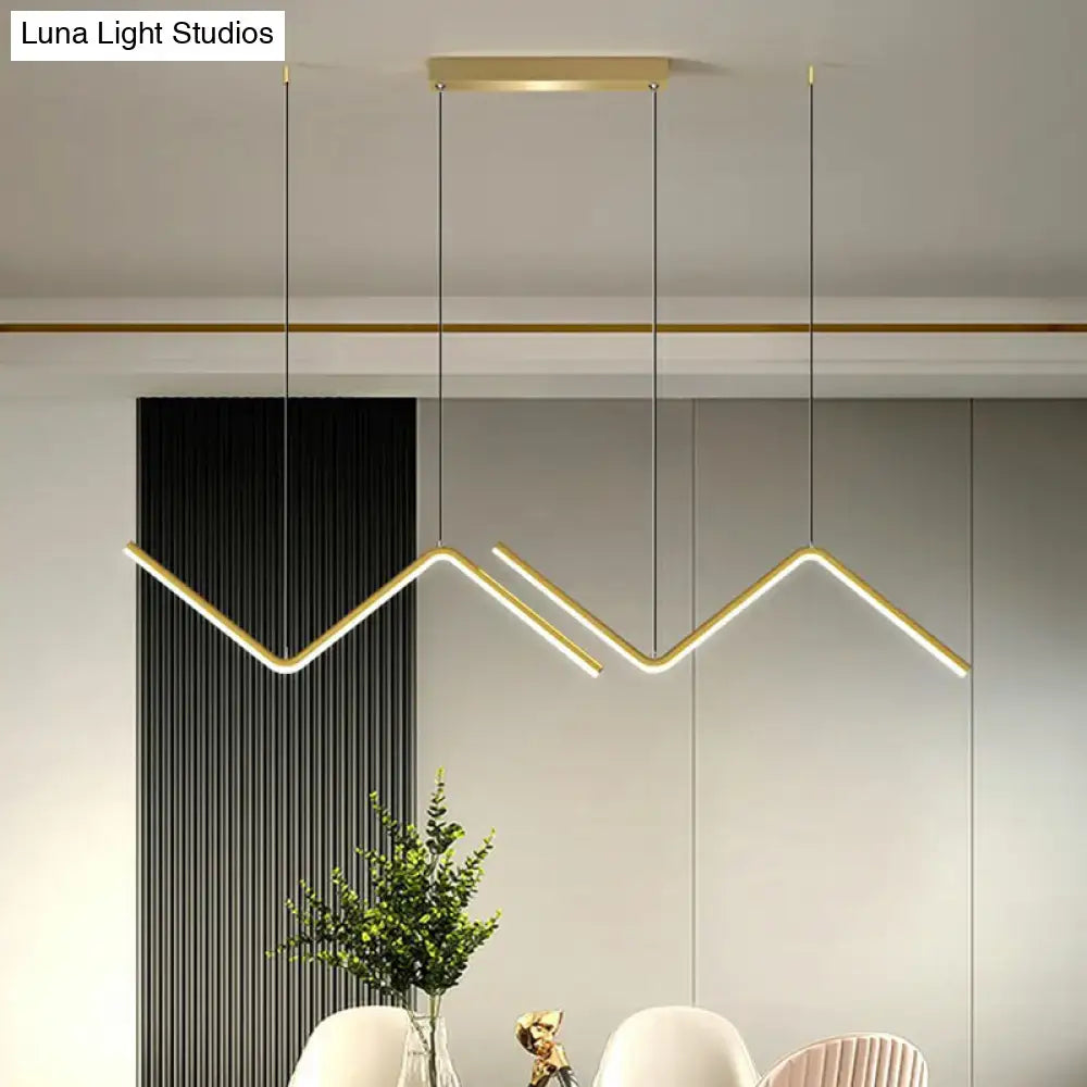 Modern gold-toned linear decorbites™ z-shaped island pendant light fixture for dining room ceiling installation