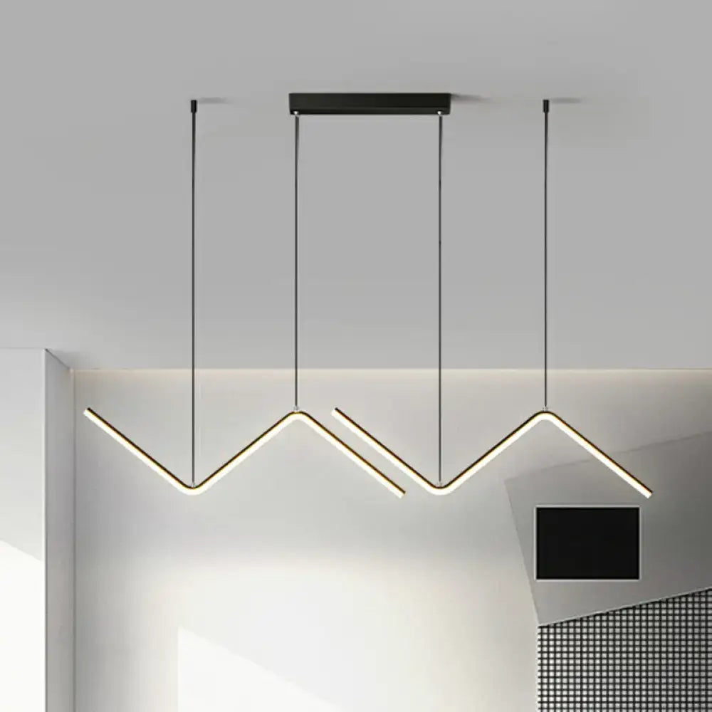 DecorBites minimalist black z-shaped island pendant light fixture with three angular led arms for dining room use