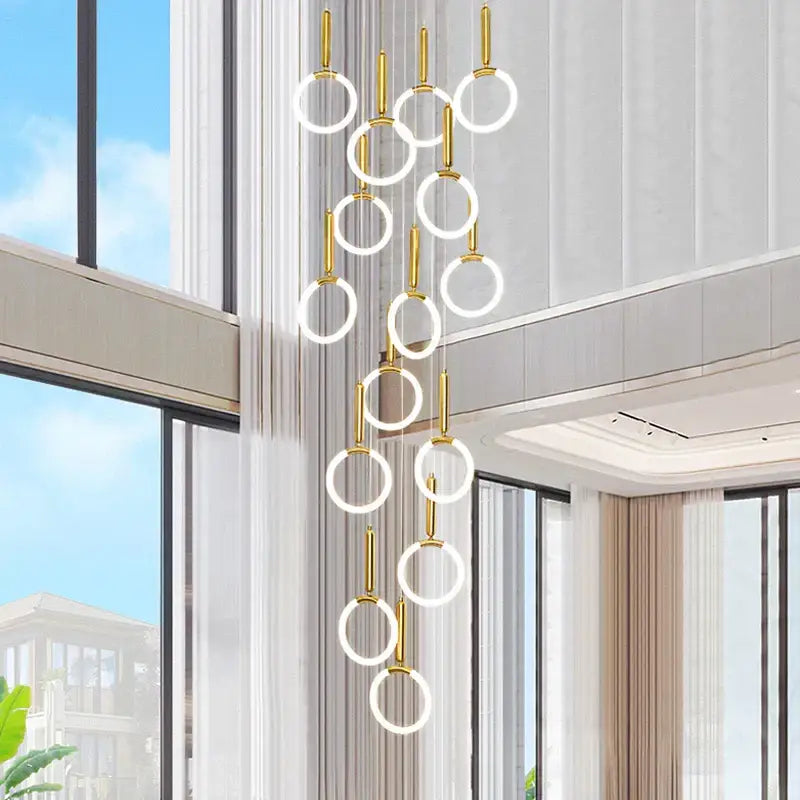 Modern golden acrylic round led chandelier with gold-toned circular pendant and glowing white led rings for living room decorbites