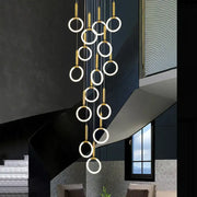Modern golden acrylic round led chandelier with illuminated gold-toned rings for living room decorbites golden acrylic