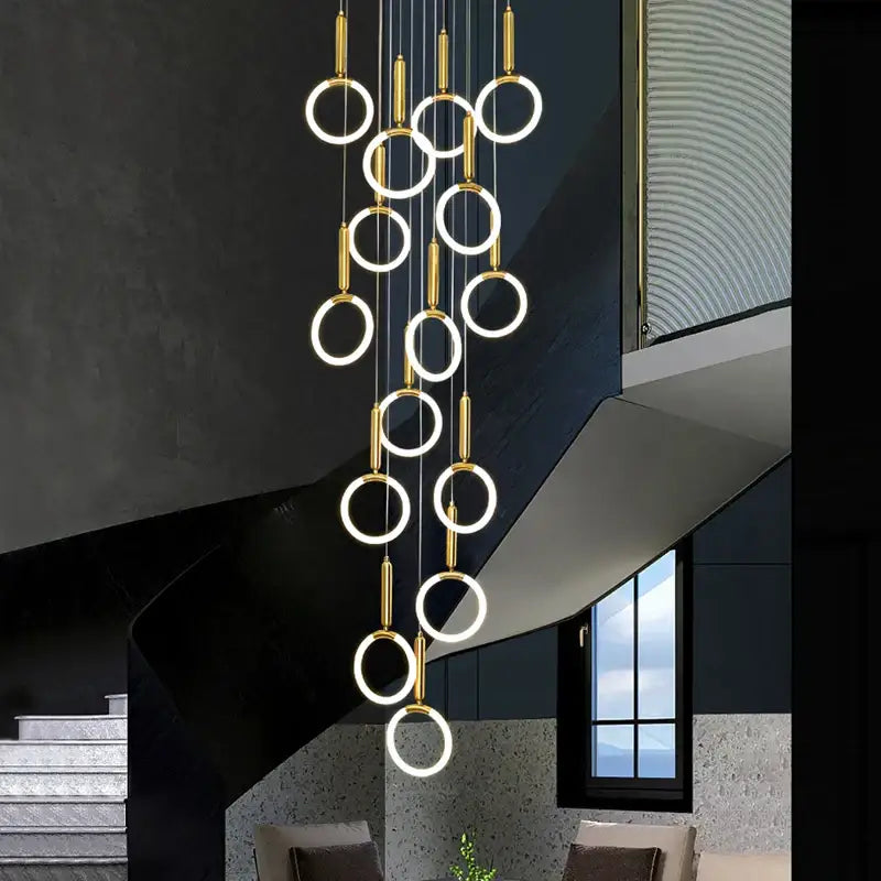 Modern golden acrylic round led chandelier with illuminated gold-toned rings for living room decorbites golden acrylic