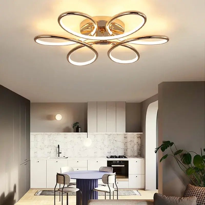 Modern golden aluminum ceiling lights with five interlocking rings and a central hub for living room decorbites golden aluminum ceiling
