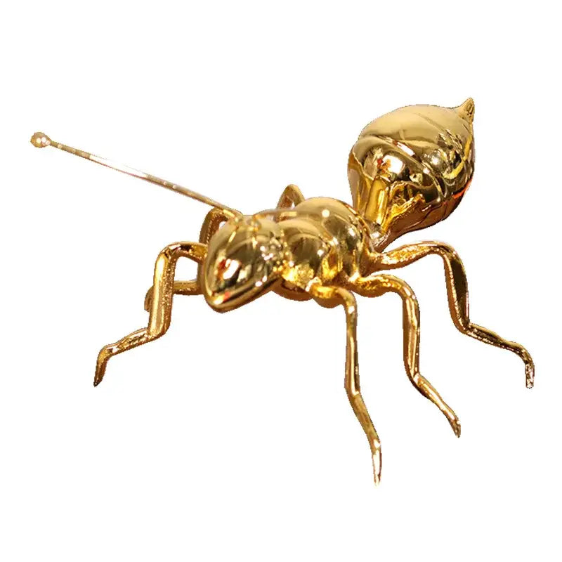 Shiny gold ant metal sculpture with segmented body and articulated legs decorbites golden ant living room decor