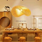 Modern golden bamboo wave shade pendant lamp with woven design ideal for dining room lighting